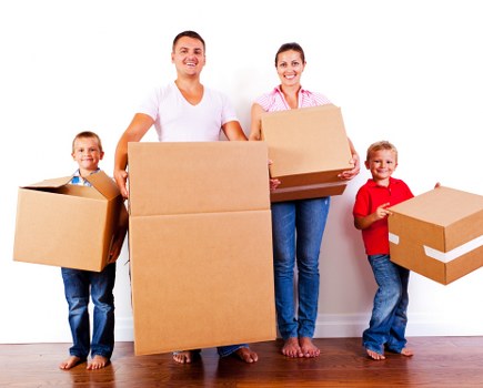 Small removals van loading furniture in Upminster