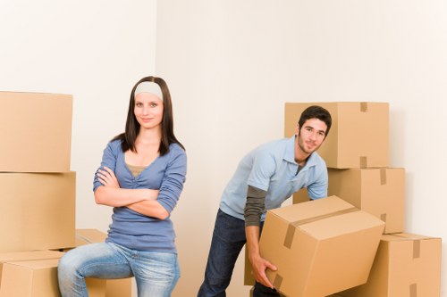 Local removals team handling fragile items during an Upminster move