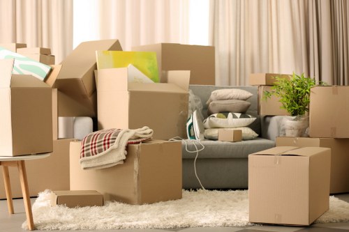 Fragile household items carefully packed for relocation in Upminster